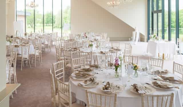 Royal Suite ballroom with floor-to-ceiling windows for corporate galas and wedding events.