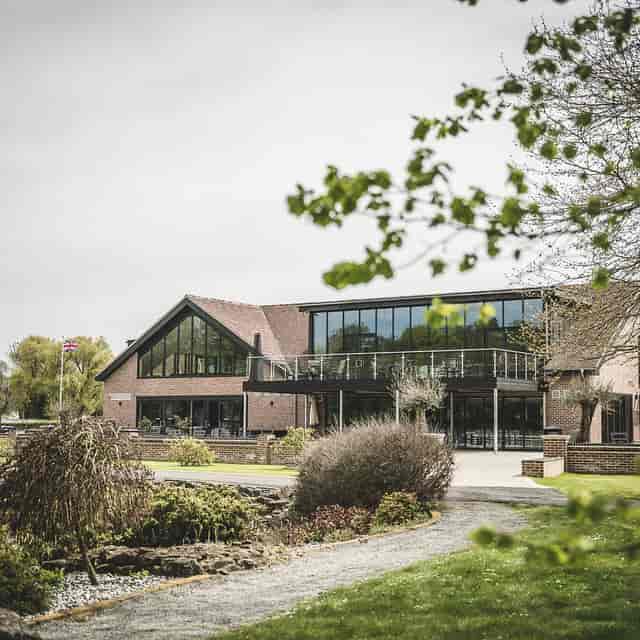 The Terrace at Cambridge Country Club, modern glass venue for corporate retreats and networking.