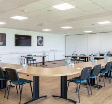 Epic Centre meeting room with U-shaped table setup for workshops and presentations in Lincolnshire.