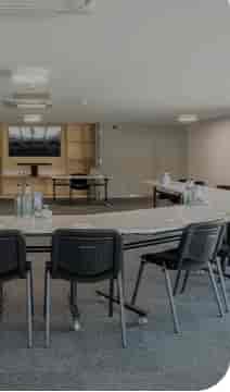 Modern meeting room at Epic Centre, Lincolnshire Showground with tables for workshops.