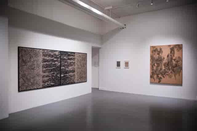Modern art gallery with polished floor for corporate events and art gatherings.