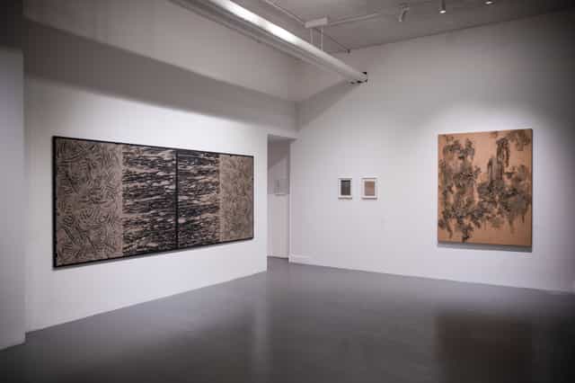 Modern art gallery with polished floor for corporate events and art gatherings.