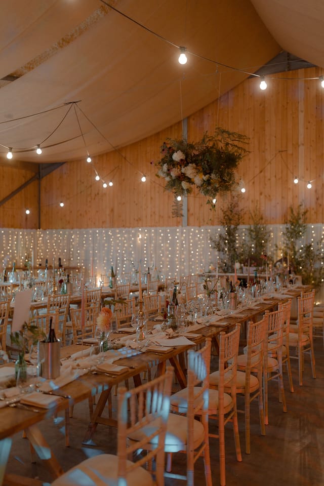 Elegant wedding venue in Carrick Castle with rustic decor and string lights.