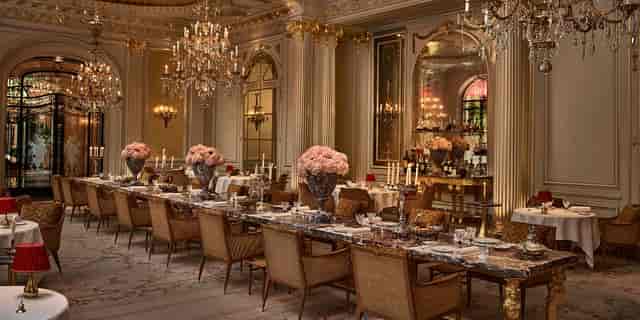 Opulent Astier ballroom with crystal chandeliers for luxury gala dinners and corporate banquets.