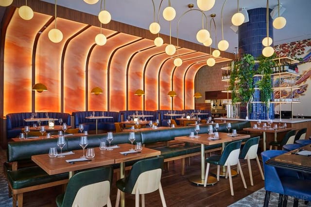 Private lounge in Minami Toronto with banquette seating for corporate dinners and networking events.