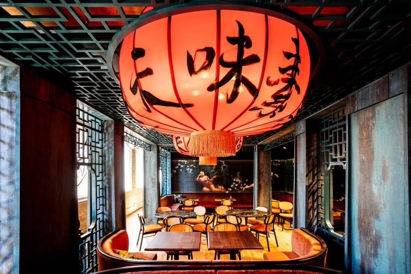 Portland Room in Portland Square with red lanterns, ideal for events and gatherings.