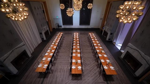Atrium at Terroni: elegant dining space with long tables for corporate events and celebrations.