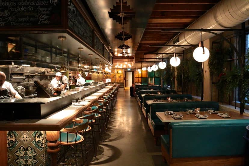 Stylish restaurant setting with modern decor, perfect for intimate dinners and events.