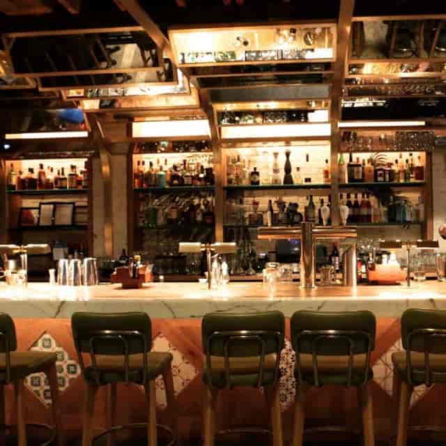 Stylish bar at The Lounge & Escobar, perfect for networking and social events.