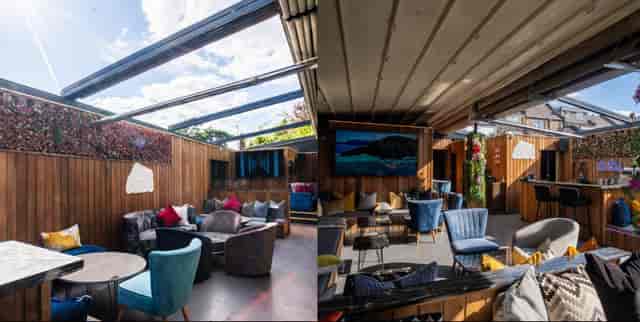 Event space with stylish furniture and open roof for meetings and social gatherings.