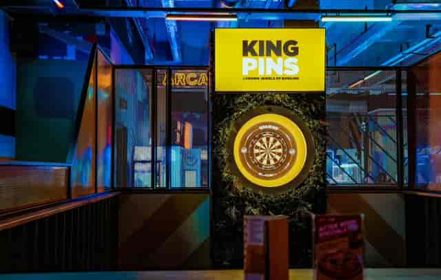 Vibrant dartboard venue in King Pins, Glasgow for team-building and networking events.