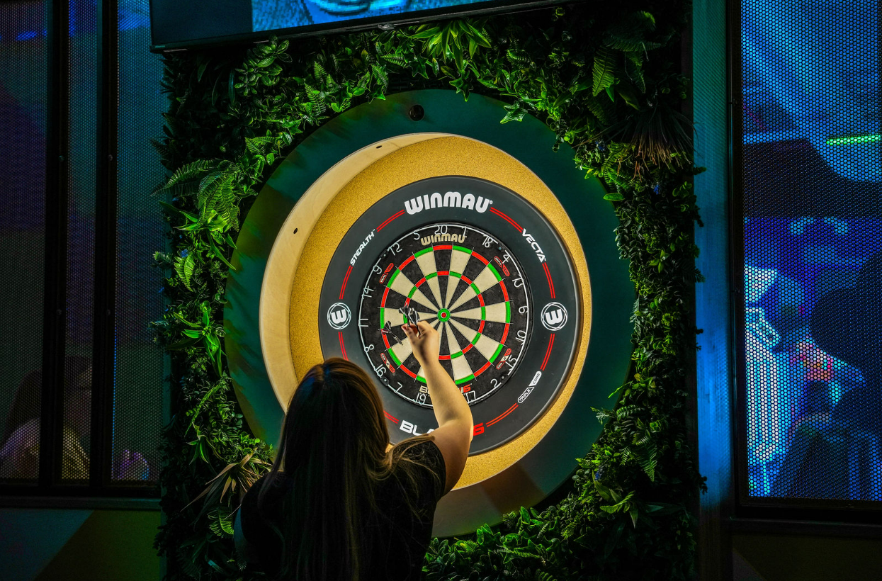 Vibrant dartboard setup at The Bullseye Zone, perfect for team-building events in Glasgow.