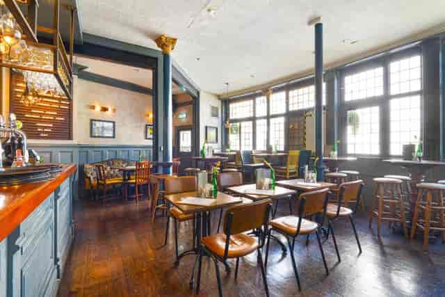 Upstairs in The Sun: versatile pub venue with modular seating for networking mixers and conferences.