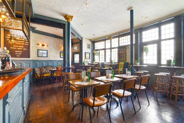 Upstairs in The Sun: versatile pub venue with modular seating for networking mixers and conferences.
