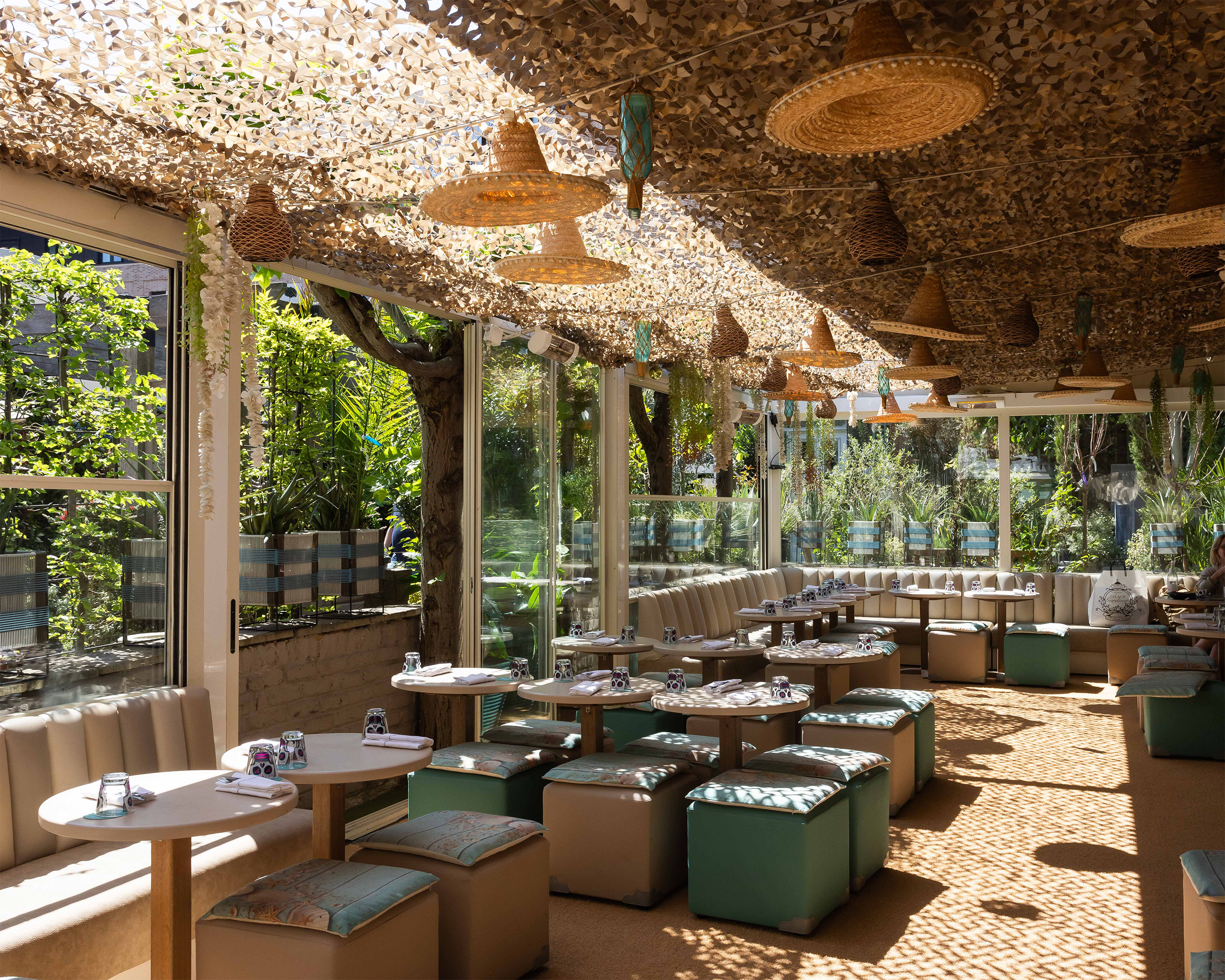 Vibrant dining space at Mezcalito Chelsea, ideal for meetings and events. - Banner