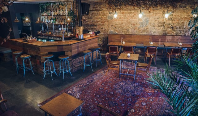 Rustic industrial Hackney event space for networking receptions and team mixers.