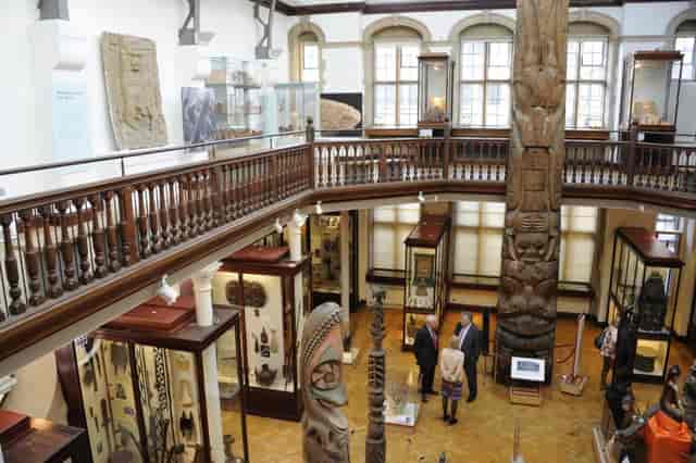 Three-floor museum gallery with historic architecture for networking events and VIP receptions.