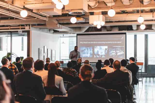 Professional meeting at Liverpool Street Event Space with engaged audience and modern venue.
