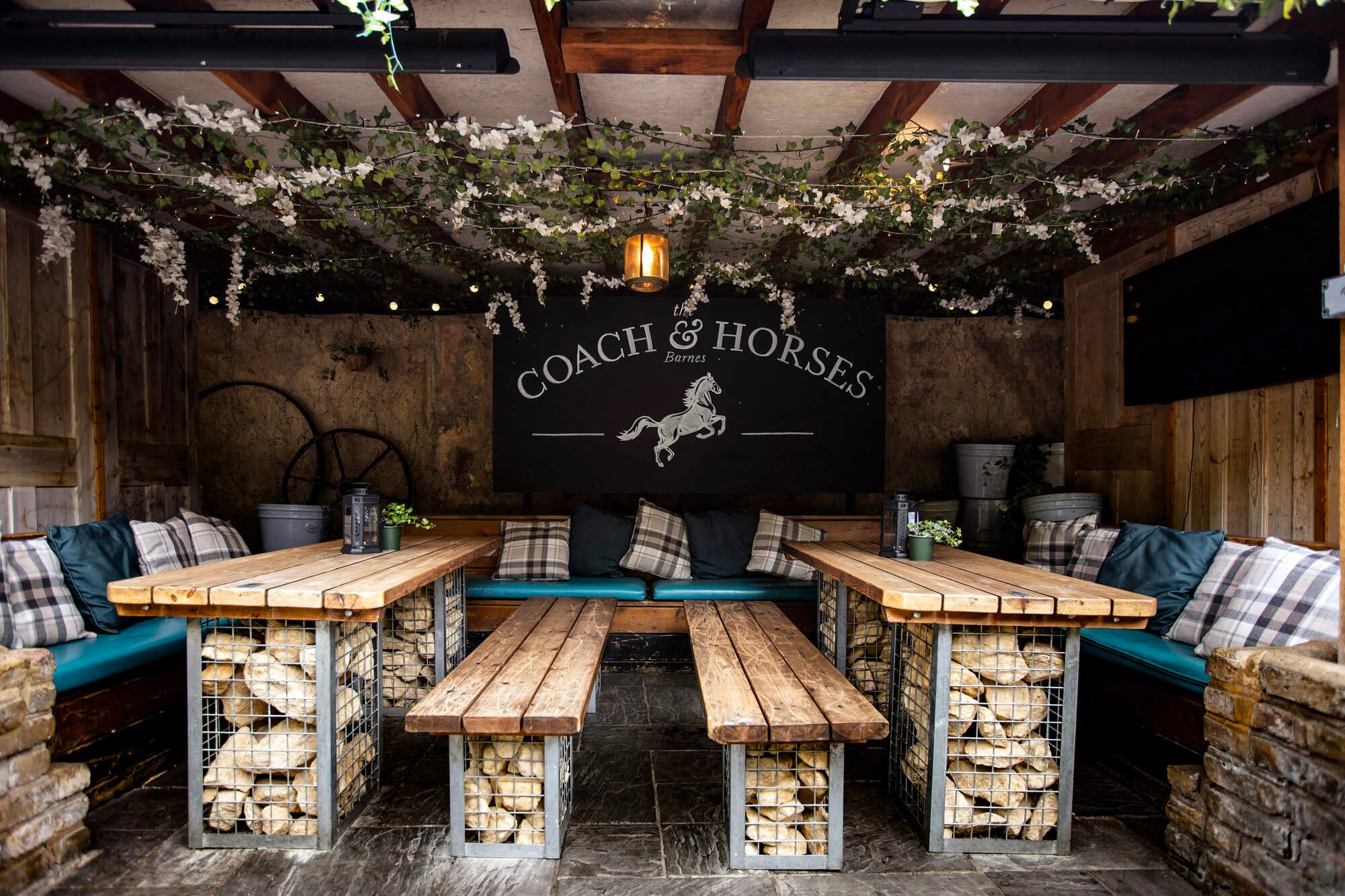 Charming dining room at Coach & Horses, ideal for intimate gatherings and team meetings. - Banner