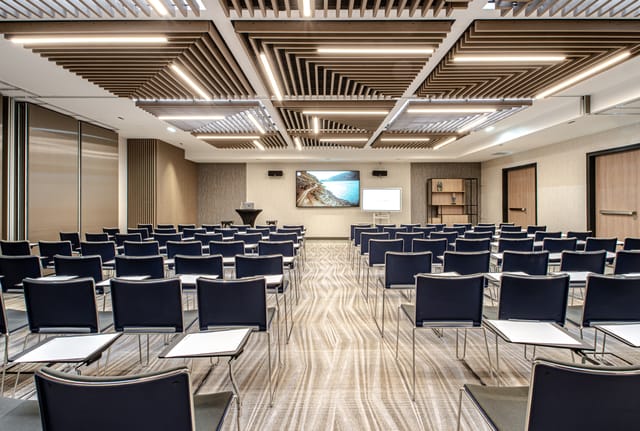 Modern conference room in Courtyard by Marriott for corporate meetings and workshops.