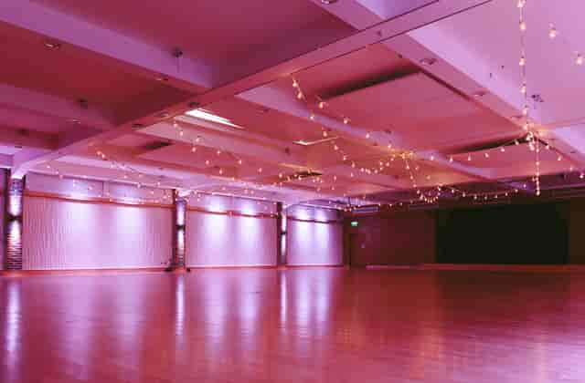 Biscuit Room venue with warm lighting, perfect for banquets and workshops.