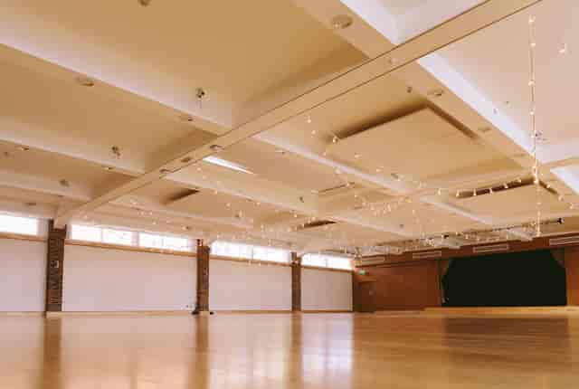 Spacious Biscuit Room venue with wooden flooring for versatile events in Birmingham.