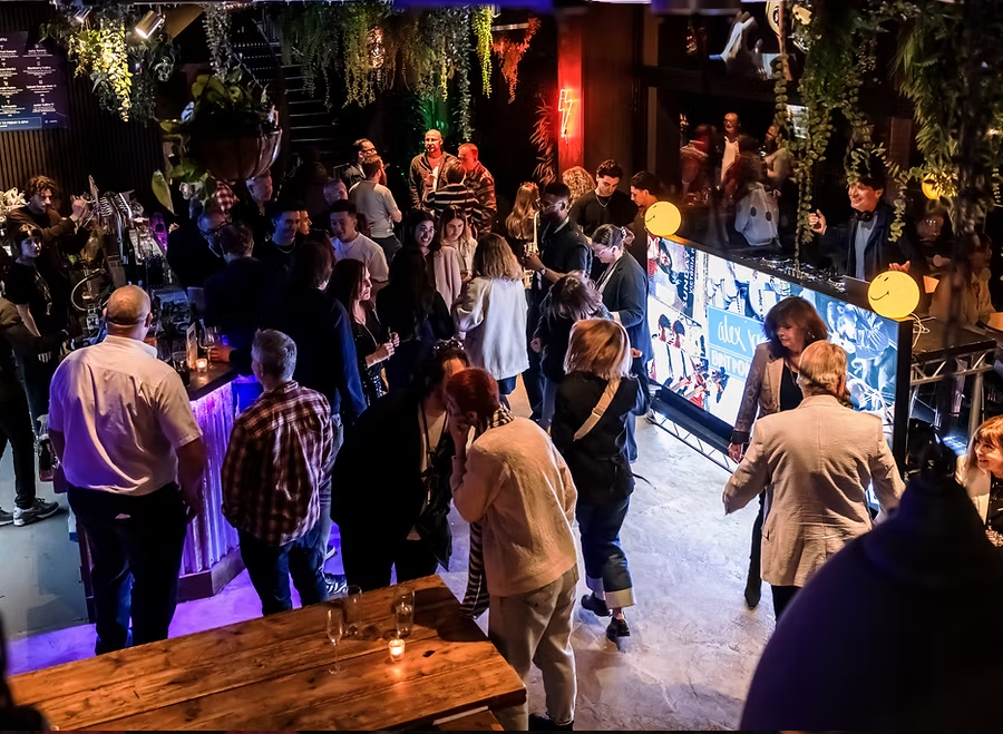 Lively networking event at The Taco House in LVLS with vibrant decor and engaging atmosphere.