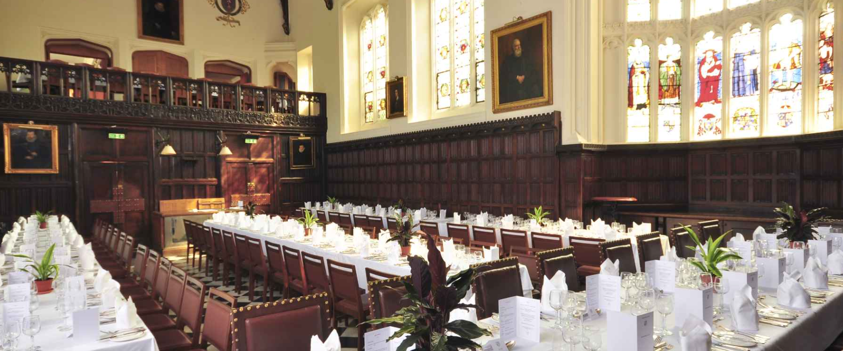 Elegant banquet hall in Christ's College, Cambridge, perfect for formal dining events.