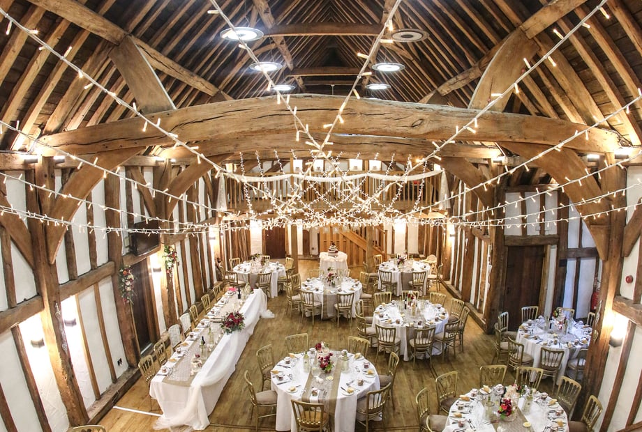 Exclusive hire venue with rustic beams, ideal for weddings and receptions. - Banner