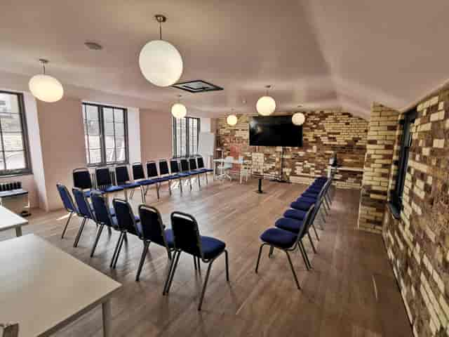 U-shaped meeting room in Mary Ward House for collaborative workshops and corporate events.