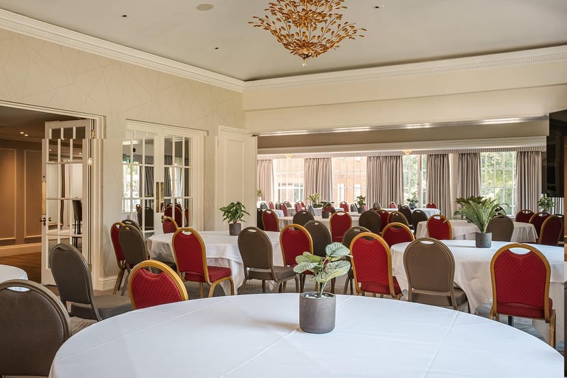 Event space in Marlborough with round tables and natural light for elegant gatherings.