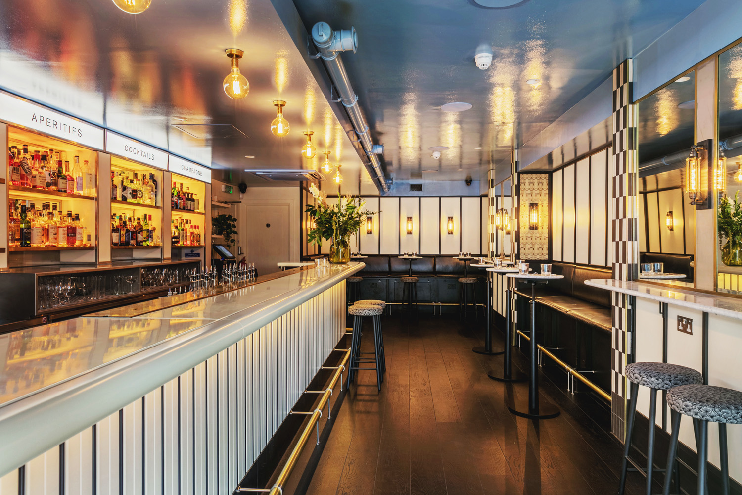 Modern upscale bar in Swift Borough, perfect for corporate receptions and VIP cocktail events. - Banner