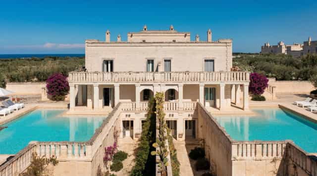 Elegant Sala Egnazia venue with tranquil pools, ideal for upscale weddings and events.