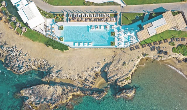 Luxurious beachfront conference room with pool area for events at Abaton Island Resort.
