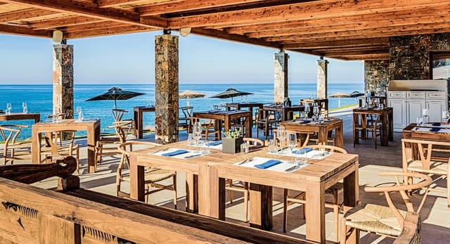 Conference room at Abaton Island Resort with ocean views for corporate retreats and social events.