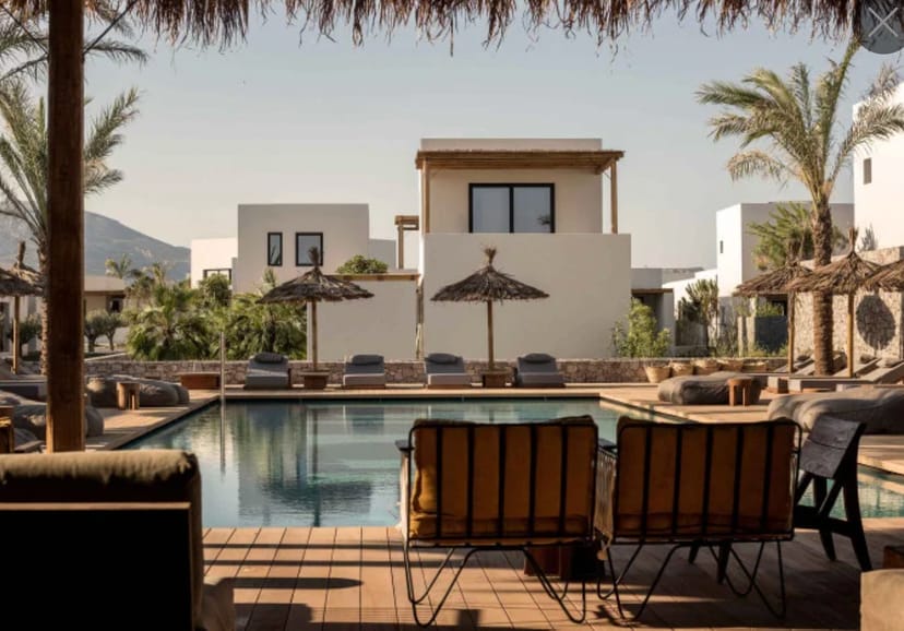 Serene poolside conference room at OKU Kos for intimate meetings and retreats.