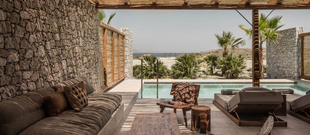 Modern conference room with pool view for intimate gatherings and meetings.