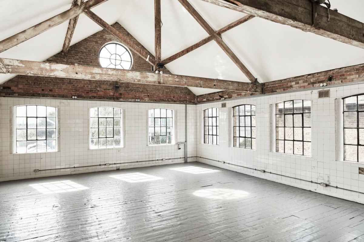 Spacious Forest Hill Depot venue with exposed beams, perfect for workshops and meetings. - Banner
