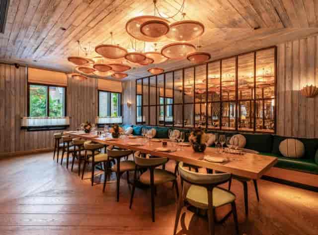 Amalfi Glass Dining Room with elegant decor, perfect for intimate gatherings and events.