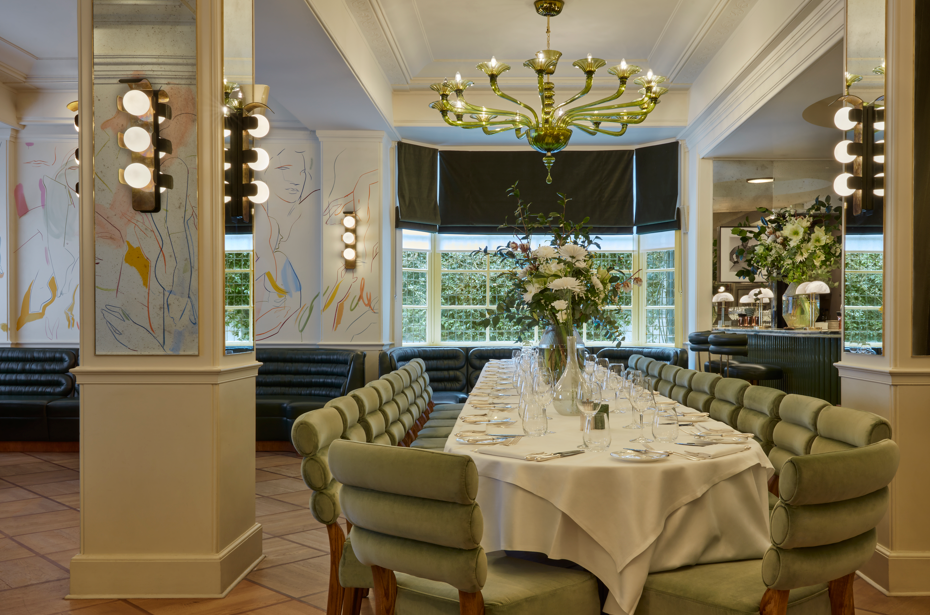 Elegant dining space in Mural Room, perfect for intimate gatherings and corporate events.