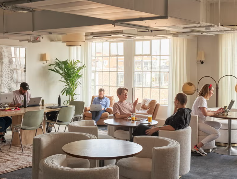 Modern co-working space in Shoreditch Lofts, ideal for networking and meetings.