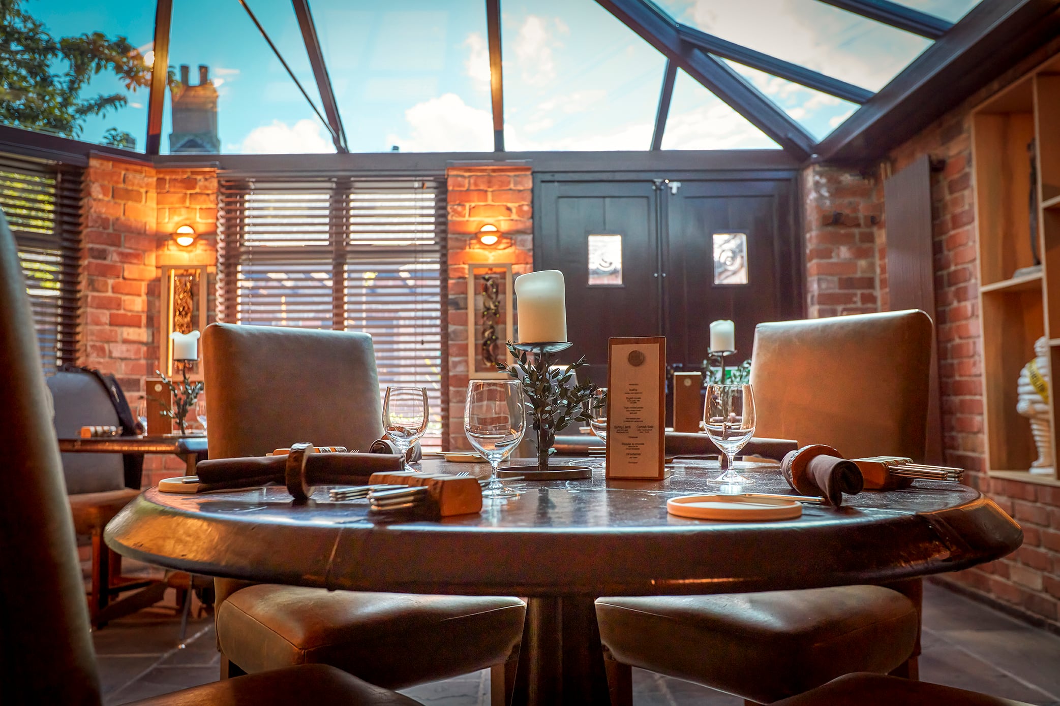 Main Restaurant at Sat Bains: stylish table setting in elegant venue for events and meetings.