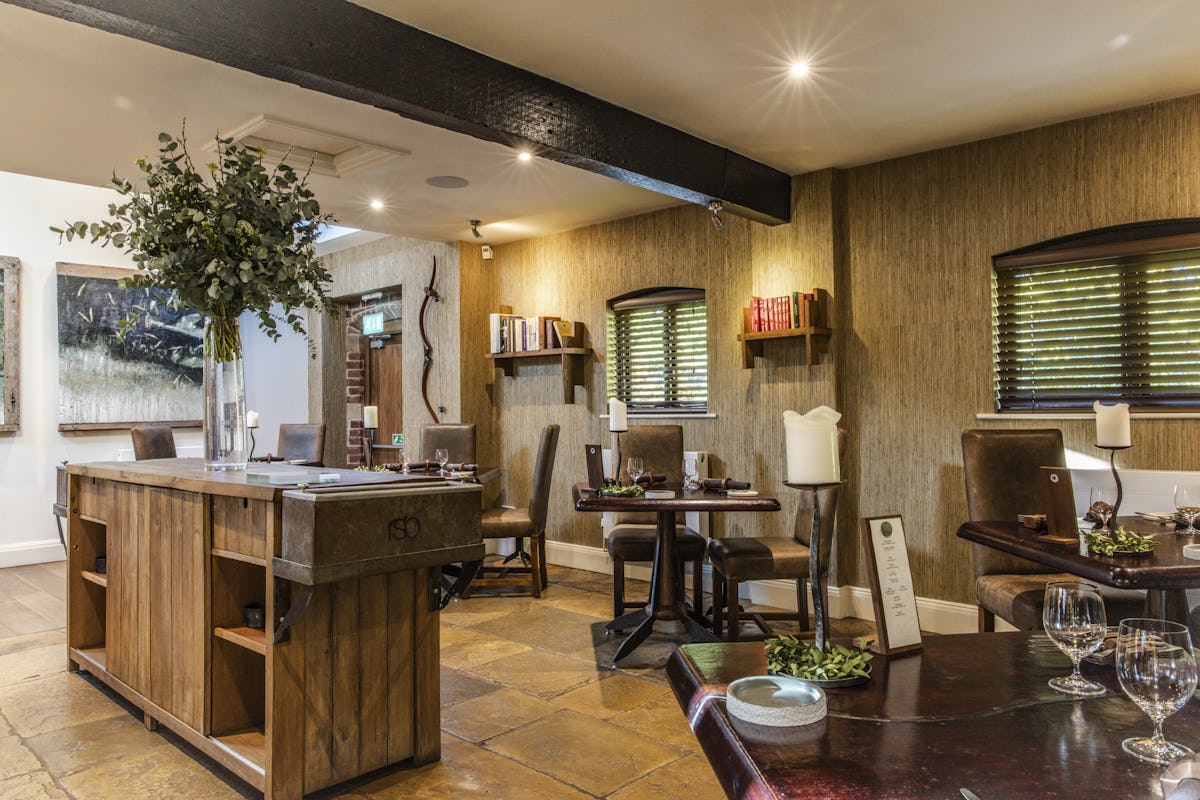 Tasting Room at Restaurant Sat Bains: rustic decor, ideal for intimate events and meetings.