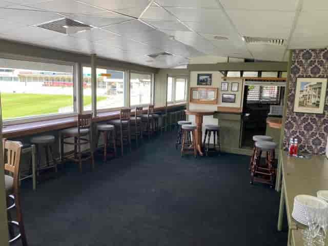 Spacious meeting venue with natural light for networking events and casual meetings.