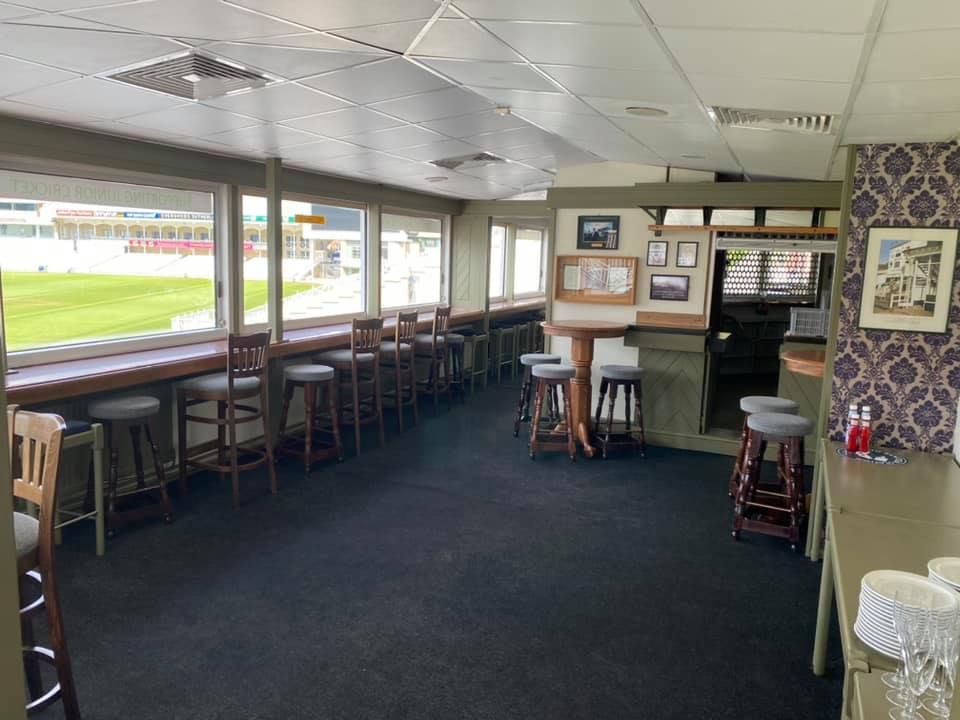 Spacious venue with outdoor view, ideal for corporate gatherings and casual networking events.