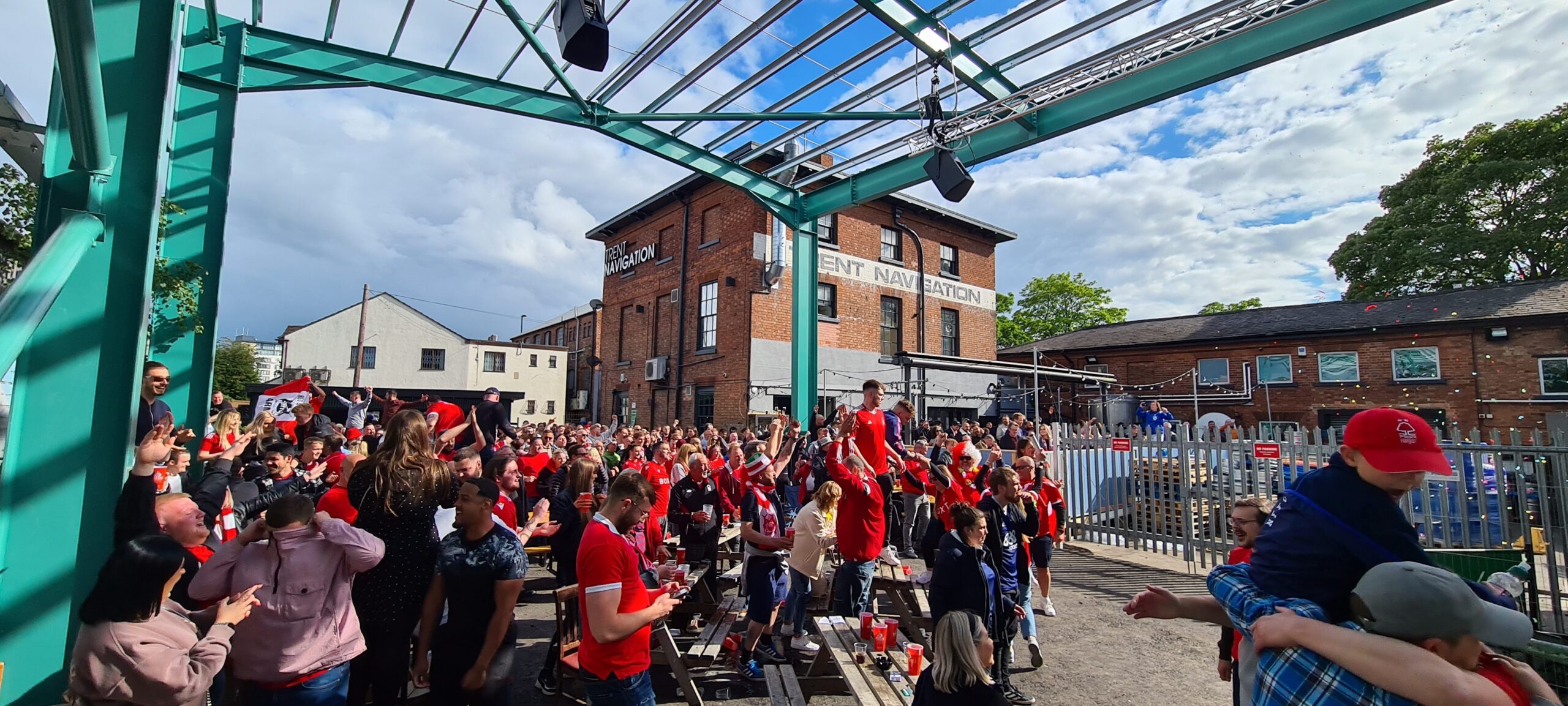 The Big Shed at Ye Olde Trip to Jerusalem bustling with crowds celebrating a local sports win.