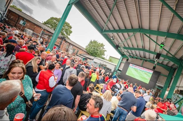 Outdoor event at The Big Shed, Ye Olde Trip to Jerusalem, for a lively sports viewing party.