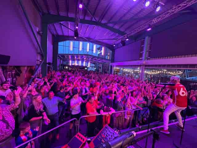 Vibrant crowd at The Big Shed, Ye Olde Trip: perfect for networking and events.