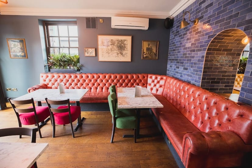 Cozy seating area in Ye Olde Trip to Jerusalem, perfect for networking events and meetings.