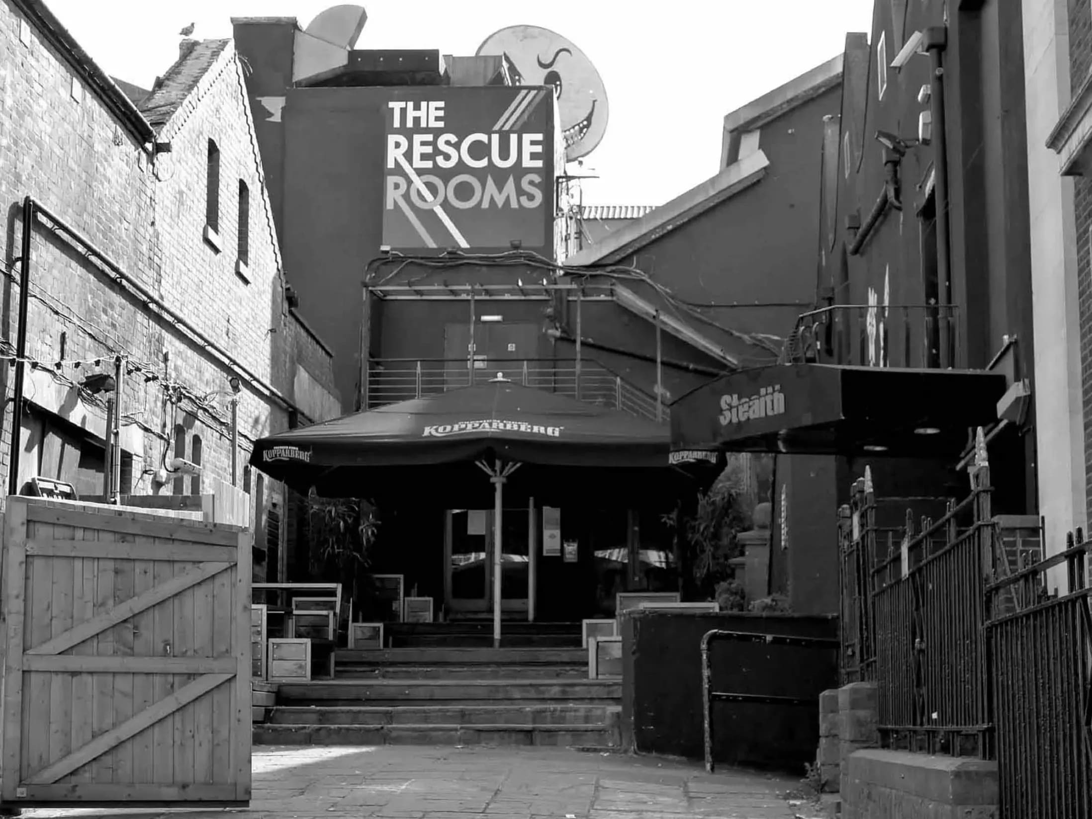 "Inviting entrance to Stealth venue, featuring stairs for concerts and events."